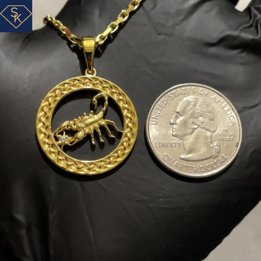 Scorpion Charm with Interwoven Eternal Braids