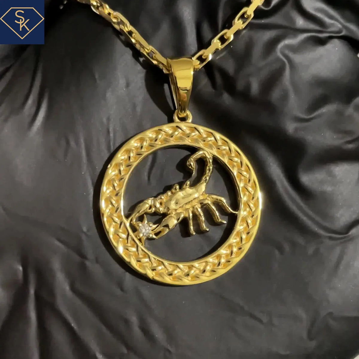 Scorpion Charm with Interwoven Eternal Braids