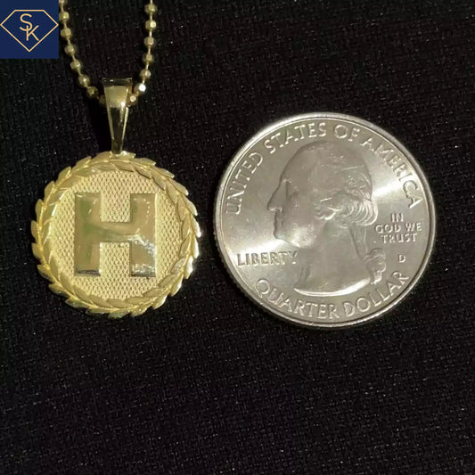 Initial H Charm
